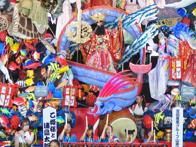 �������i